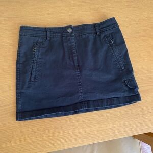 Vintage (early 2000s) Prada black mini skirt.  Small.